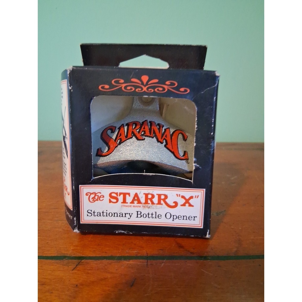 The Starr X Wall Mounted Stationary Bottle opener  New In Box Original . SARANAC